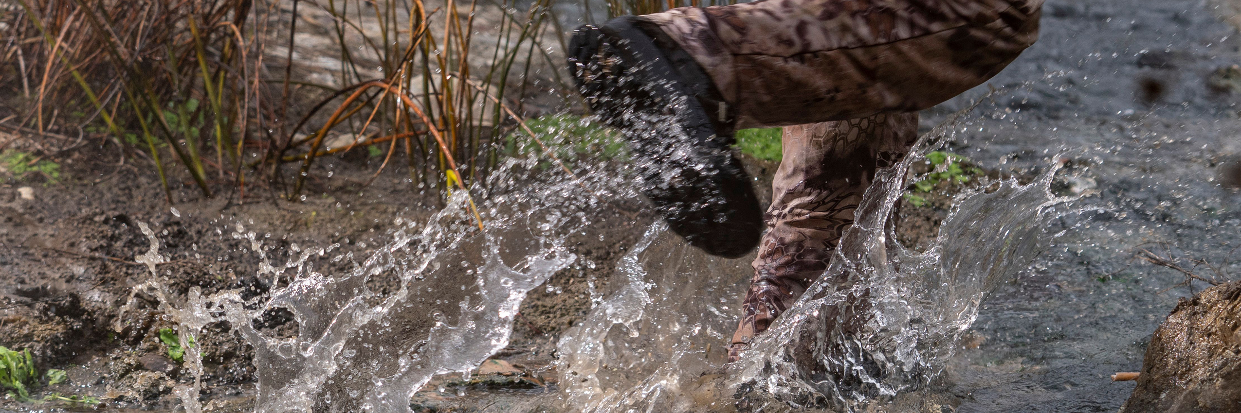 Man Hiking in River